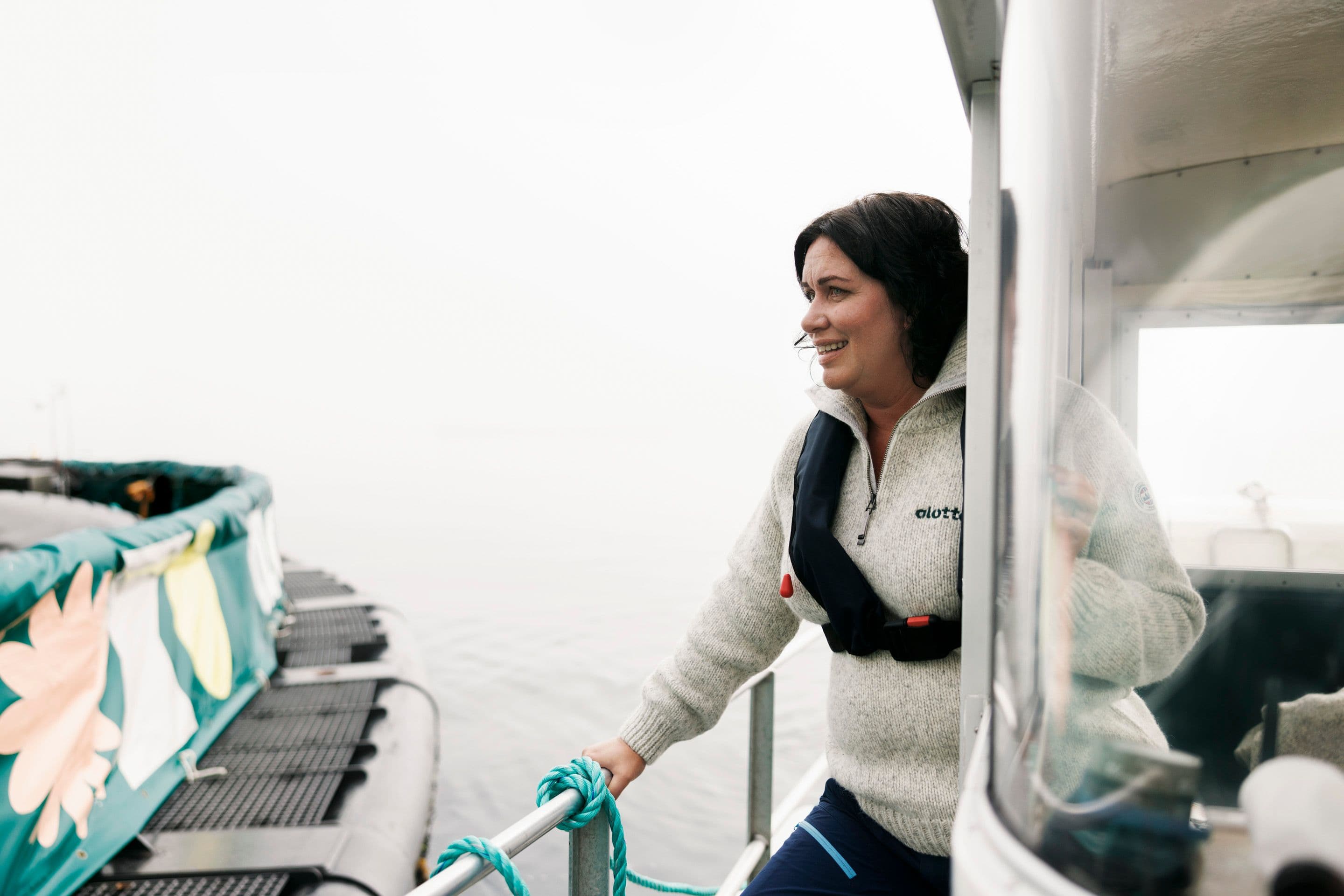 Kari-Elin Hildre standing on a boat